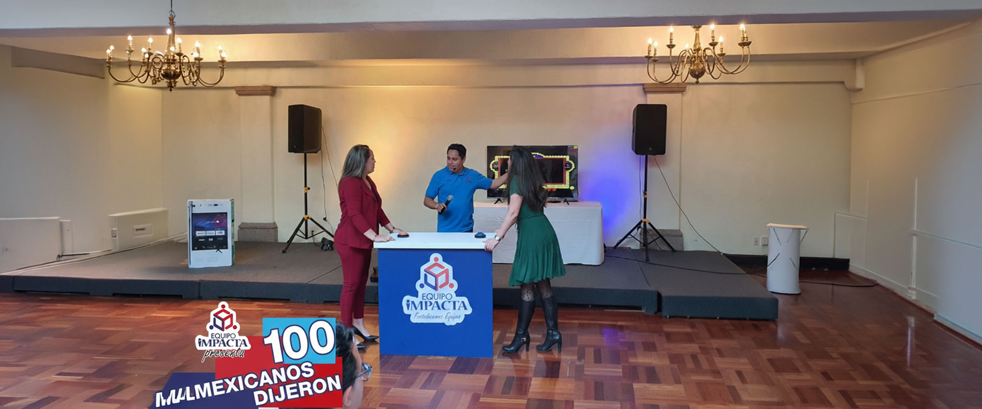 Fotografía de un evento empresarial en el que se lleva a cabo la dinámica 100 colaboradores dijeron por Equipo Impacta.